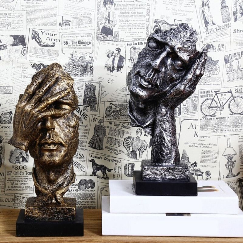 BRONZE -COLED -MAN -STATUE