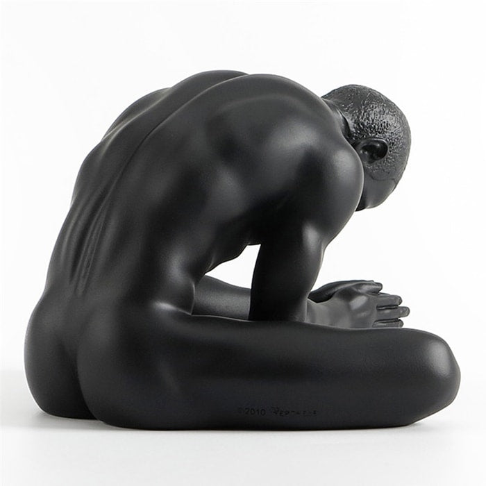 Statue -Mann sitzend