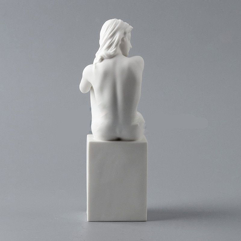 Weiße nackte Frau Statue